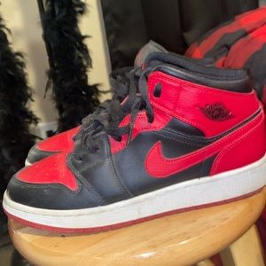 Red and black jordan 1s
